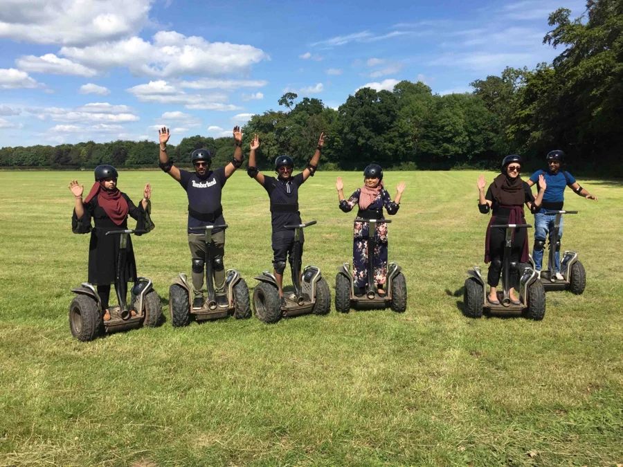 A group enjoying a Segway ride in the open countryside at Escot